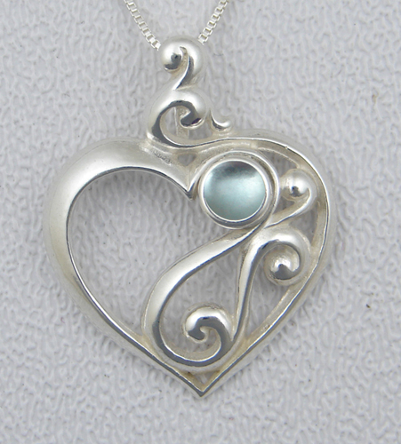 Sterling Silver Fancy Heart Pendant in Blue Topaz